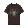 Baptized in the Mudhole T-Shirt front view: A white-robed figure stands in dark bayou water beneath cypress trees, framed by a mud-tire ring.