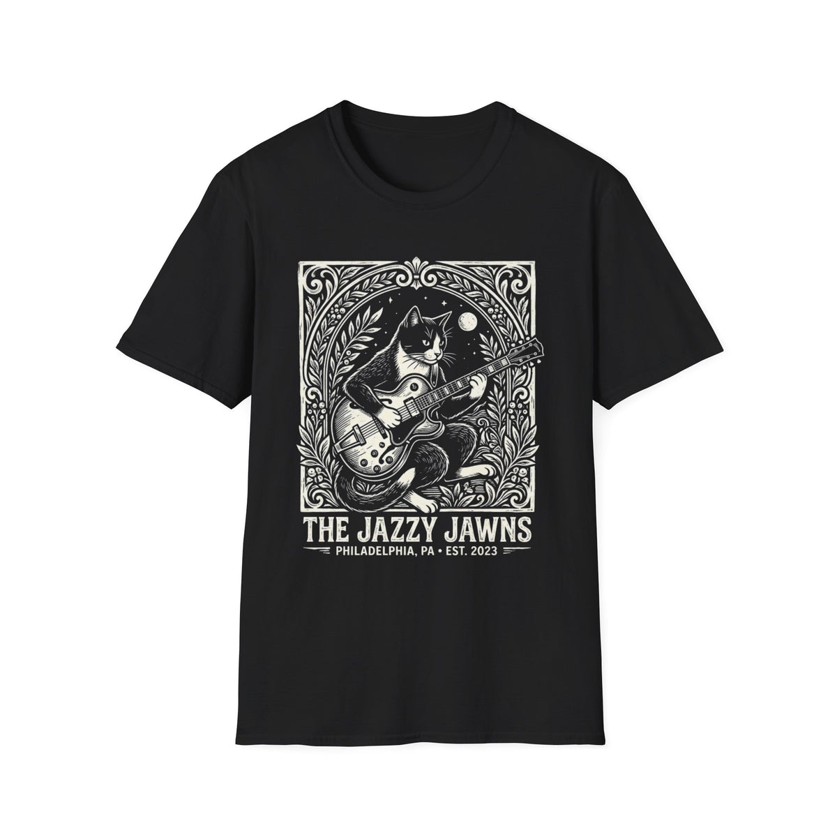 The Jazzy Jawns Guitar Cat T-Shirt front view: A guitar-playing cat sits inside an ornate botanical frame with The Jazzy Jawns lettering below.